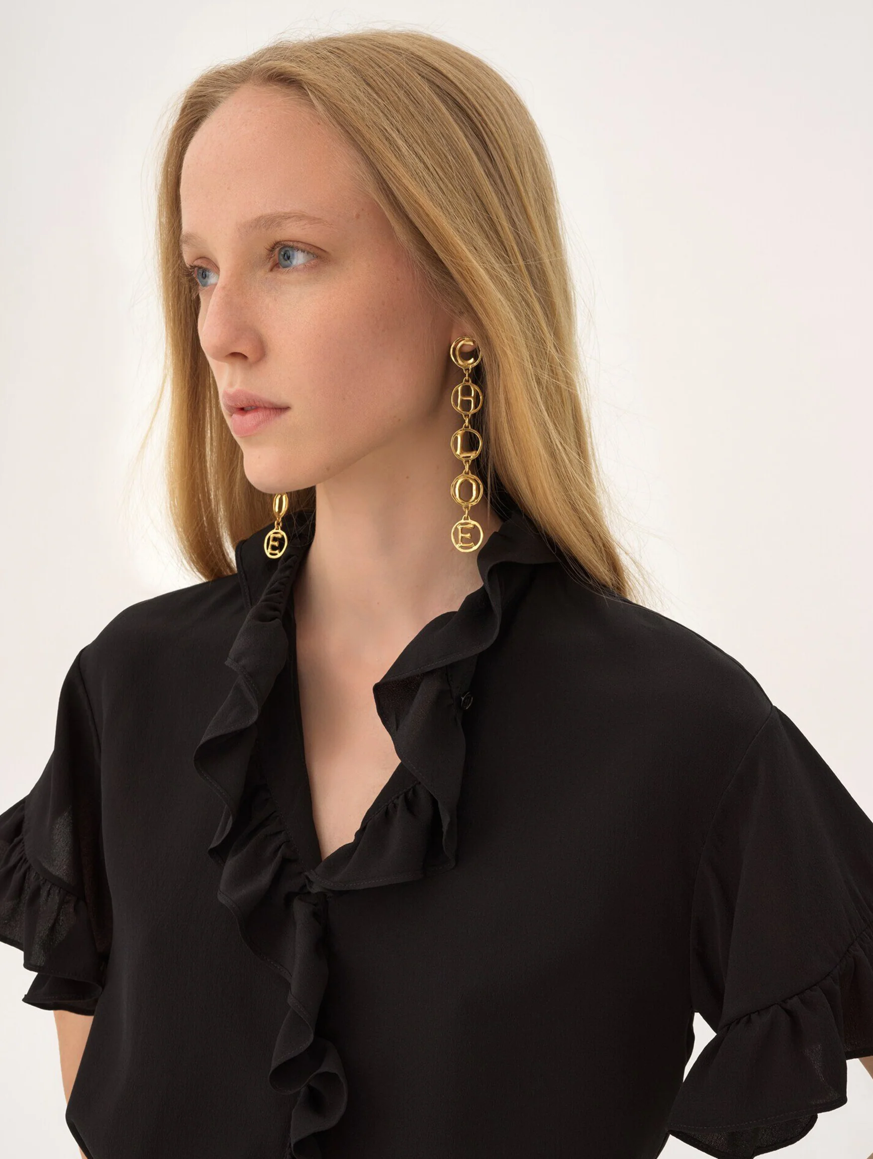 The Chloé Script Earrings in Vintage Gold - Image 2